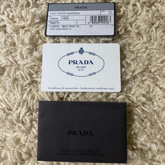 جوعان prada authenticity card size 